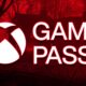 xbox game pass logo over red tinted forza horizon 4 lake house driveway promo screenshot